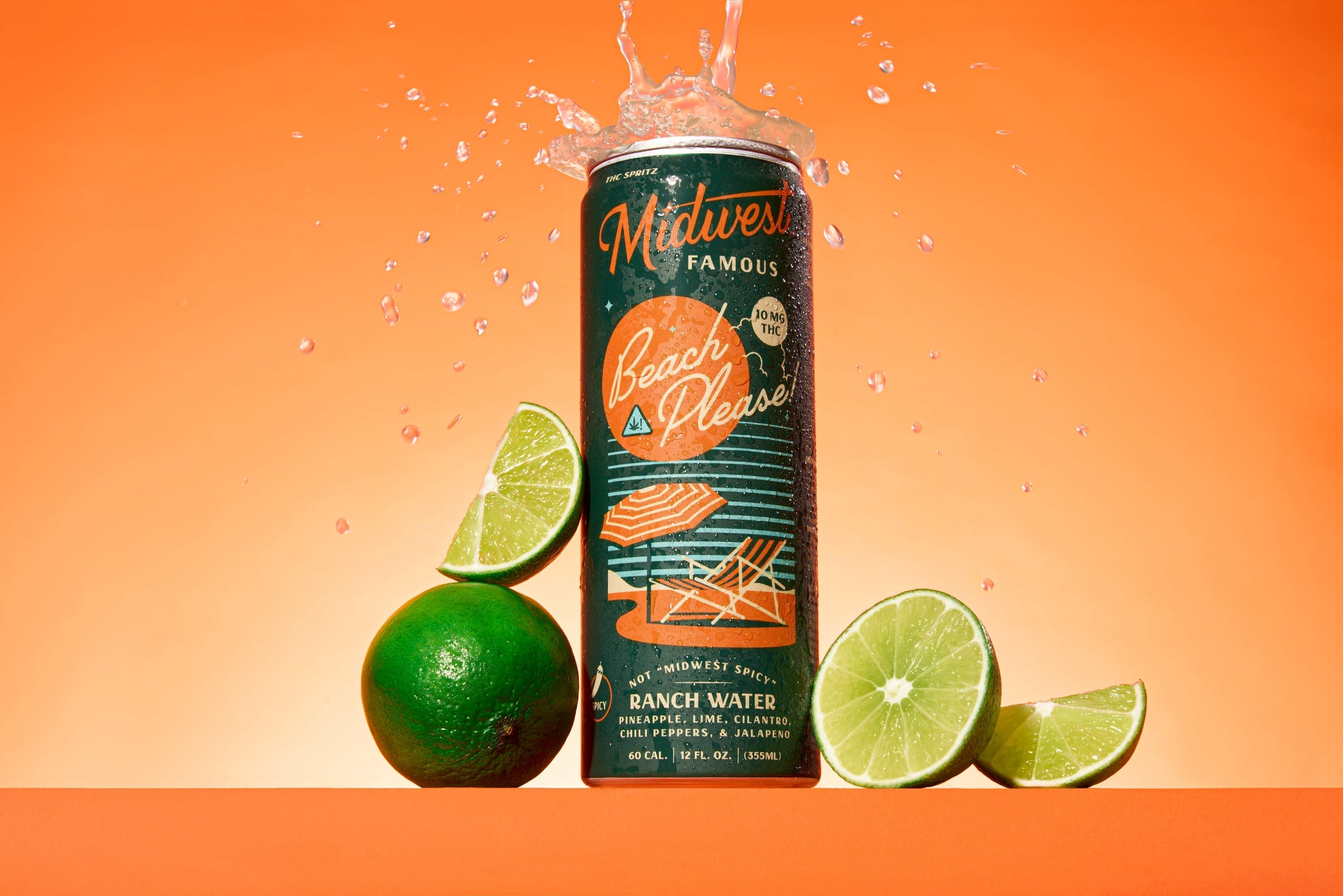 a green thc drink can in front of a orange background with limes
