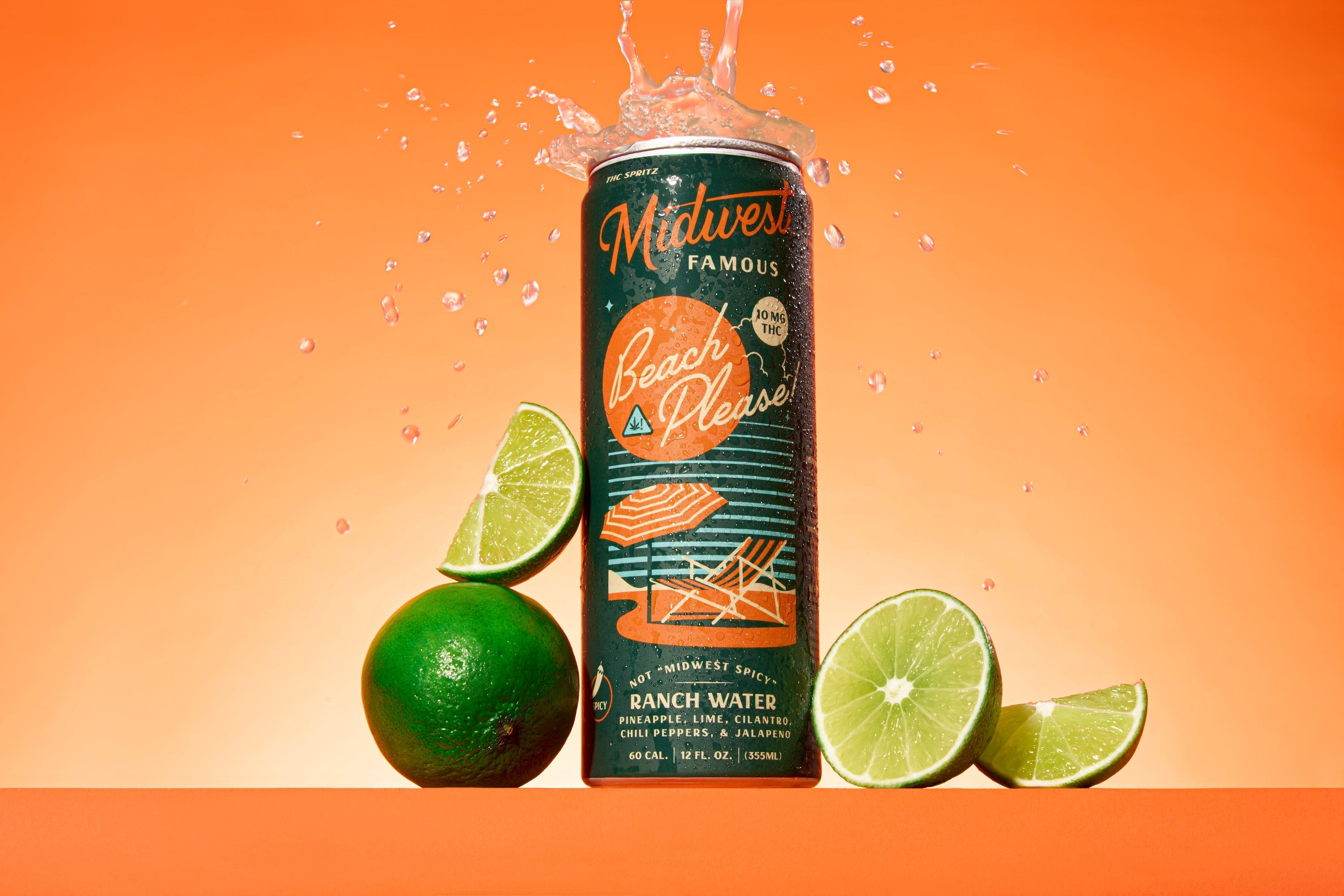 a green thc drink can in front of a orange background with limes